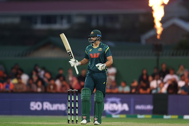 Tim David of Australia celebrates after scoring a half-century.