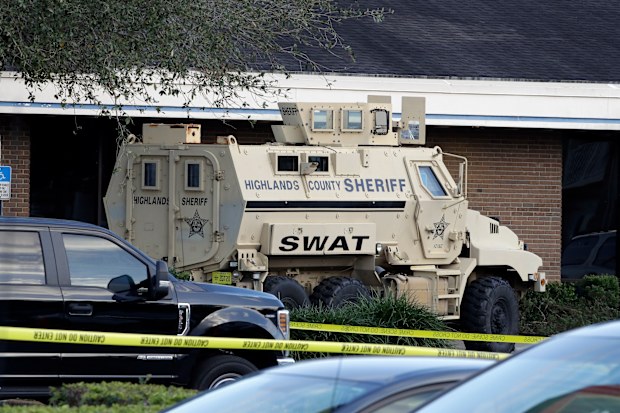 A Highlands County Sheriff's SWAT vehicle is stationed out in front
