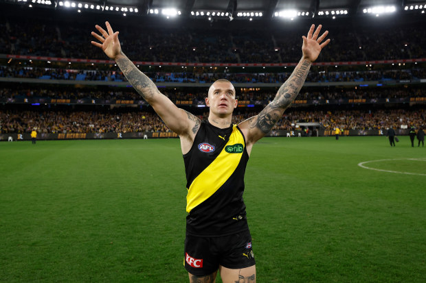 Dustin Martin of the Tigers recognises the crowd after his 300th game.