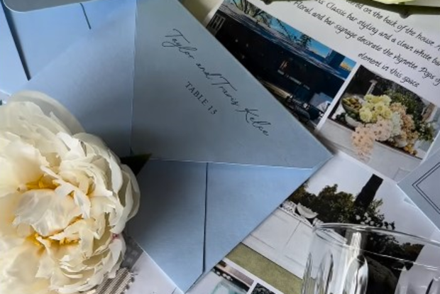 Wedding planner shares video featuring an envelope with Taylor and Travis Kelce written on it