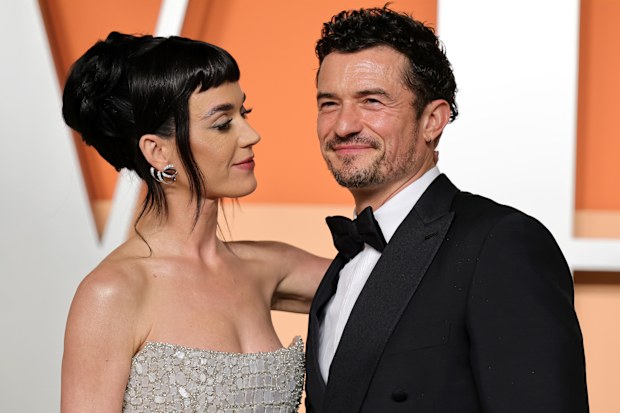 Katy Perry and Orlando Bloom at the 2025 Vanity Fair Oscar Party at Wallis Annenberg Center for the Performing Arts on March 2, 2025 in Beverly Hills, California.  