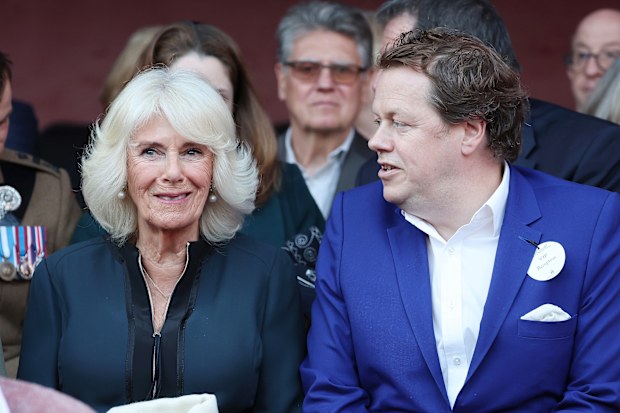 LONDON, ENGLAND - JUNE 08: Queen Camilla and Tom Parker Bowles attend a reception at the Queen's reading room literary festival at Hampton Court Palace on June 08, 2024 in London, England. The Queen was joined at the reception by authors, actors and supporters of literature including Helena Bonham Carter, Harlan Coben, Miriam Margolyes, Lee Child and Ian Rankin. (Photo by Chris Jackson - Pool/Getty Images)