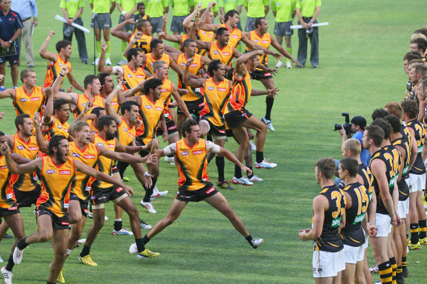 The Indigenous All Stars perform their ceremonial war dance before an AFL exhibition match against the Richmond Tigers at Traeger Park on February 8, 2013 in Alice Springs, Australia.