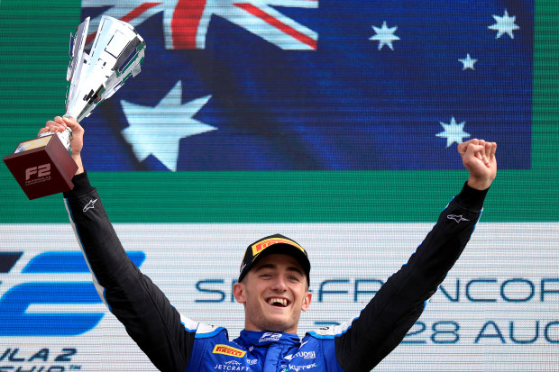 Race winner Jack Doohan of Australia and Virtuosi Racing (3) celebrates on the podium during the Round 11:Spa-Francorchamps Feature race of the Formula 2 Championship at Circuit de Spa-Francorchamps on August 28, 2022 in Spa, Belgium. (Photo by Alex Pantling - Formula 1/Formula Motorsport Limited via Getty Images)