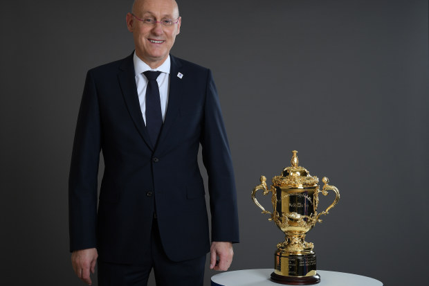 Bernard Laporte poses with The Webb Ellis Cup prior to the Rugby World Cup France 2023 draw at Palais Brongniart.
