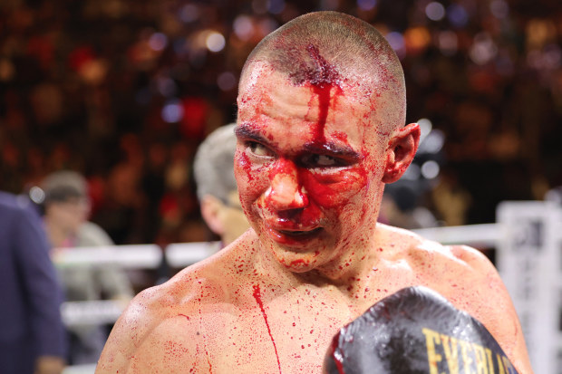 Tim Tszyu walks to his corner after a 12-round fight against Sebastian Fundora.