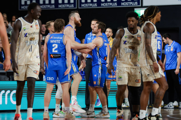 BRISBANE, AUSTRALIA - OCTOBER 7: Aron Baynes of the Bullets is held back by teammates after exchanging words with officials during the round two NBL match between Brisbane Bullets and Cairns Taipans at Nissan Arena, on October 7, 2023, in Brisbane, Australia. (Photo by Russell Freeman/Getty Images)
