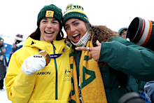 Gold medallist Jakara Anthony of Team Australia poses for a photo with former professional athlete and IOC Member Jessica Fox following the medal ceremony for the Women's Dual Moguls on day eight of the Milano Cortina 2026 Winter Olympic games at Livigno Air Park on February 14, 2026 in Livigno, Italy 