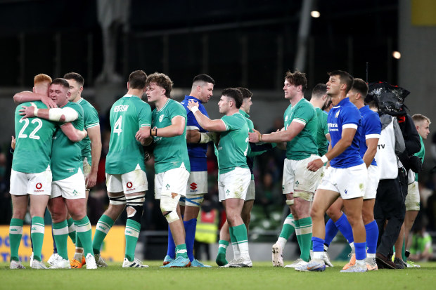 Ireland's players celebrate at the end of the international rugby union match against Italy.