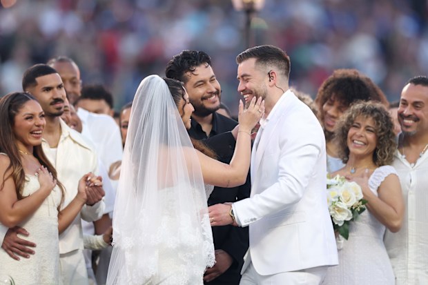 A couple marries during the Bad Bunny performance at the Super Bowl LX Halftime Show at Levi's Stadium on February 8, 2026 in Santa Clara, California. 