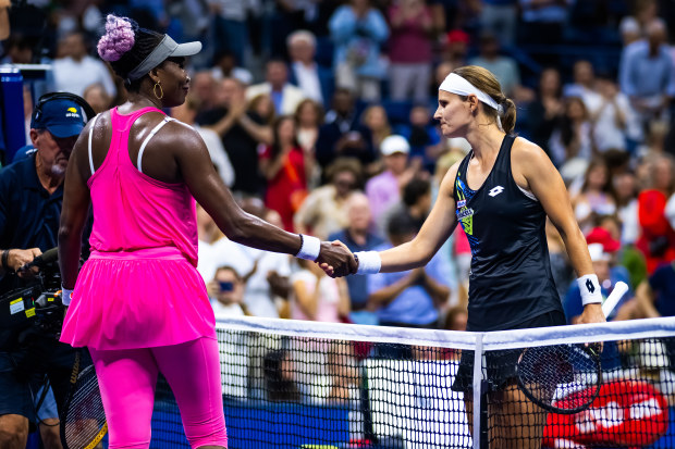NEW YORK, NEW YORK - AUGUST 29: Venus Williams of the United States and Greet Minne of Belgium shake hands at the net after the first round on Day 2 of the US Open at USTA Billie Jean King National Tennis Center on August 29, 2023 in New York City (Photo by Robert Prange/Getty Images)