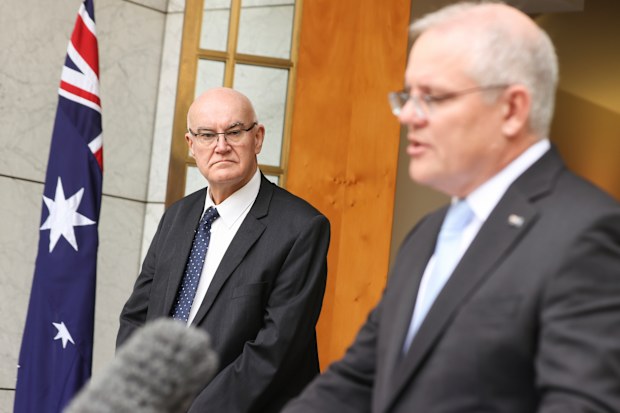 Professor John Skerritt from the Therapeutic Goods Administration (TGA) and Prime Minister Scott Morrison during a press conference at Parliament House today.
