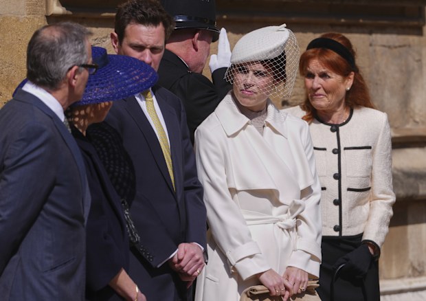 Princess Eugenie, centre, with her mother Sarah Ferguson, 