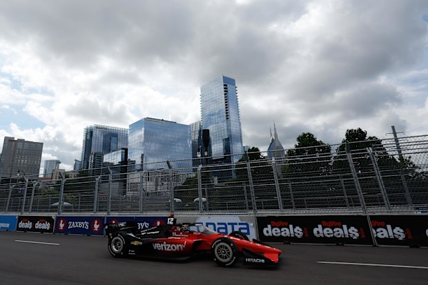 Will Power drives over the bridge at the Nashville Street Circuit.
