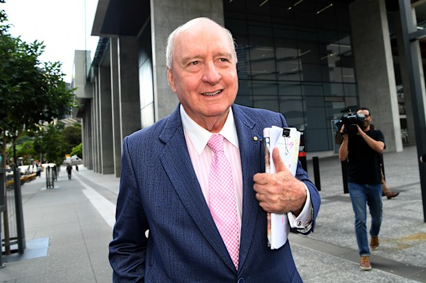 Jones presented a cheery facade after day one of his defamation case despite the allegations against him. (AAP)