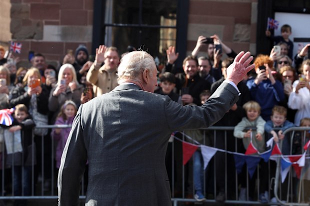 Britain's King Charles III waves to the public following his visit to Lichfield Cathedral, in Lichfield, England, Monday, Oct. 27, 2025. (Temilade Adelaja/Pool Photo via AP)