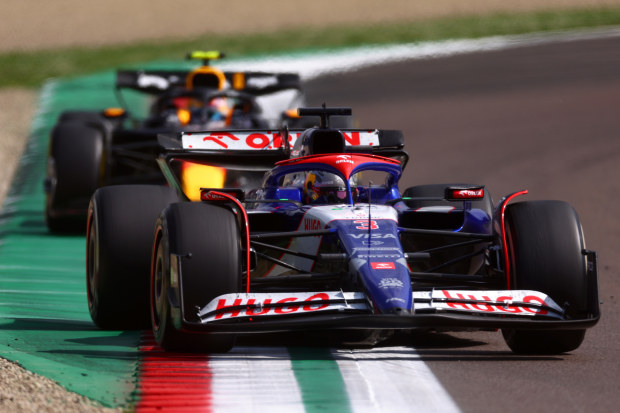 Daniel Ricciardo leads Sergio Perez in the Emilia-Romagna Grand Prix. 