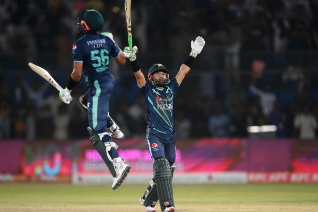 Mohammad Rizwan and Babar Azam of Pakistan celebrate victory  during the 2nd IT20 match between Pakistan and England on September 22, 2022 in Karachi, Pakistan. (Photo by Alex Davidson/Getty Images)