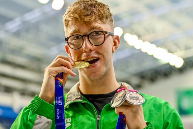 Dublin , Ireland - 13 August 2023; Daniel Wiffen of Ireand poses for a portrait with his 1500m freestyle gold medal, 400m freestyle silver medal and 800m freestyle silver medal during day three of the European U23 Swimming Championships at the National Aquatic Centre in Dublin. (Photo By Tyler Miller/Sportsfile via Getty Images)
