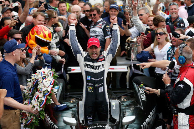 Tony Kanaan won the 2013 Indianapolis 500 with Australian team owner Kevin Kalkhoven.