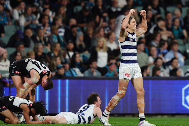 Rhys Stanley of the Cats reacts on the siren.
