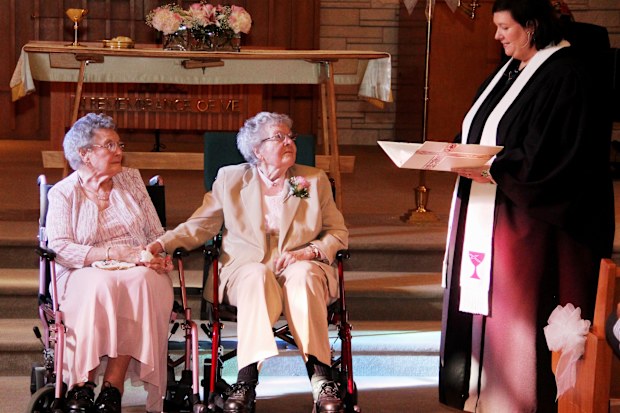 Vivian Boyack, 91, and Alice “Nonie” Dubes, 90, have married after 72 years together. (AP Photo/The Quad City Times, Thomas Geyer)