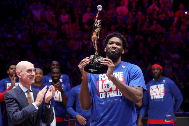 PHILADELPHIA, PENNSYLVANIA - MAY 05: Joel Embiid #21 of the Philadelphia 76ers hoist the MVP trophy after being named 2022-23 Kia NBA Most Valuable Player prior to game three of the Eastern Conference Second Round Playoffs against the Boston Celtics at Wells Fargo Center on May 05, 2023 in Philadelphia, Pennsylvania. 