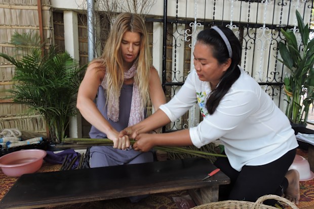 Leanne Savage working with a member of the Acala Stem team in Cambodia.