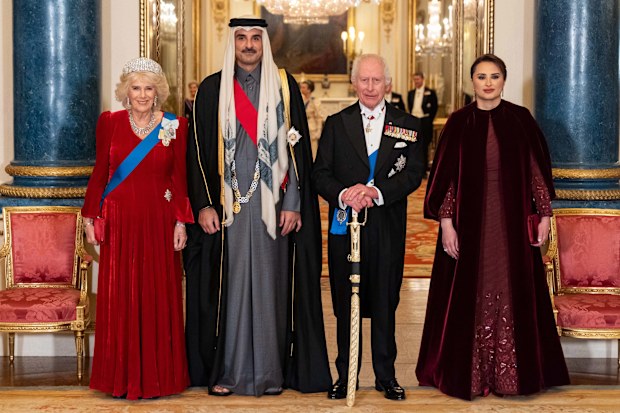 King Charles III (2nd R) and Queen Camilla (L) with the Emir of Qatar Sheikh Tamim bin Hamad Al Thani and his wife Sheikha Jawaher bint Hamad bin Suhaim al-Thani ahead of a state banquet at Buckingham Palace during day one of The Amir of the State of Qatar's visit to the United Kingdom on December 3, 2024 in London, England. His Highness Sheikh Tamim bin Hamad Al Thani, Amir of the State of Qatar, accompanied by Her Highness Sheikha Jawaher bint Hamad bin Suhaim Al 