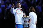 Novak Djokovic had a custom "22" jacket made for his 22nd grand slam victory.