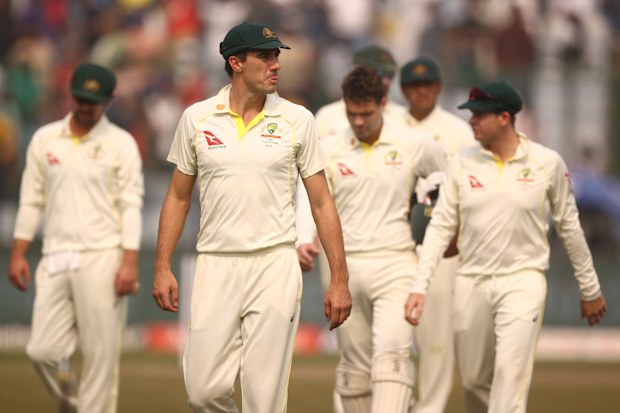 DELHI, INDIA - FEBRUARY 19: Pat Cummins of Australia leads the team off the ground after they were defeated by India during day three of the Second Test match in the series between India and Australia at Arun Jaitley Stadium on February 19, 2023 in Delhi, India. (Photo by Robert Cianflone/Getty Images)