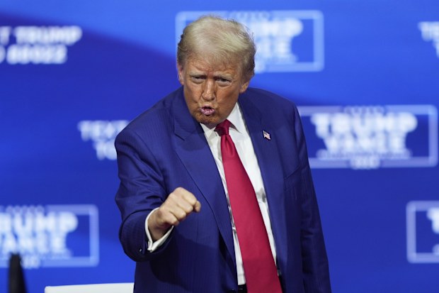 Republican presidential nominee former president Donald Trump arrives at a campaign town hall at the Greater Philadelphia Expo Center & Fairgrounds on Monday, Oct. 14, 2024, in Oaks, Pa.