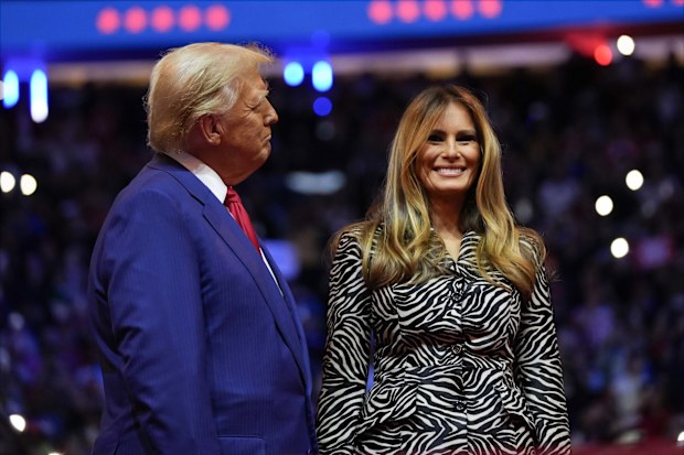 Republican presidential nominee former President Donald Trump and former first lady Melania Trump stand on stage at a campaign rally at Madison Square Garden, Sunday, Oct. 27, 2024, in New York. (AP Photo/Alex Brandon)