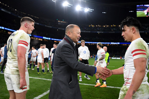 England coach Eddie Jones shakes Marcus Smith 's hand ater their side's draw with the All Blacks.