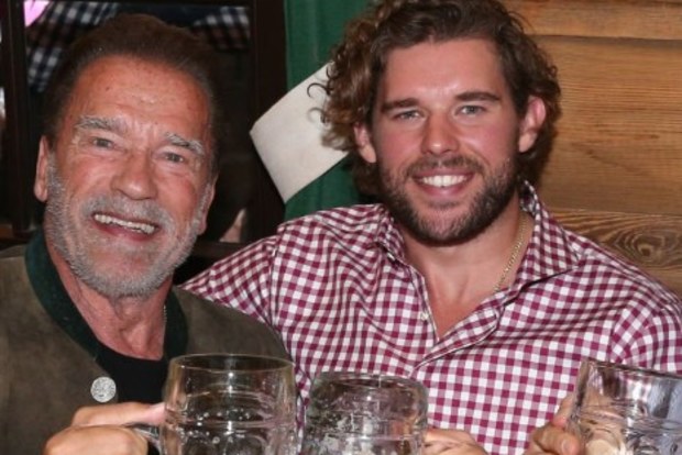 Arnold Schwarzenegger and sons Christopher Schwarzenegger and Patrick at Oktoberfest in Munich, Germany on September 24, 2022.