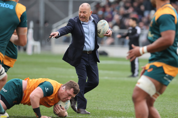 Eddie Jones of Australia gives instructions during warmups.