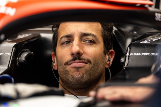 Daniel Ricciardo of Australia and Scuderia AlphaTauri sits in the car during Formula 1 testing at Yas Marina Circuit.