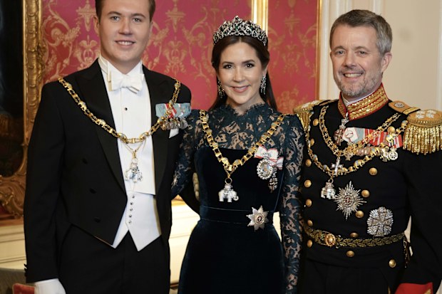 King Frederik and Queen Mary with their son and heir Crown Prince Christian on the New Year's gala, January 1 2025 at Amalienborg in Copenhagen.