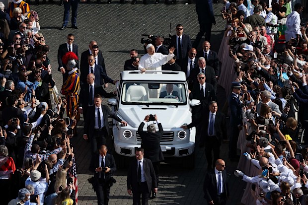 Pope Leo XIV greets visitors and worshippers ahead of the Inauguration Mass of Pope Leo XIV, at Vatican City 