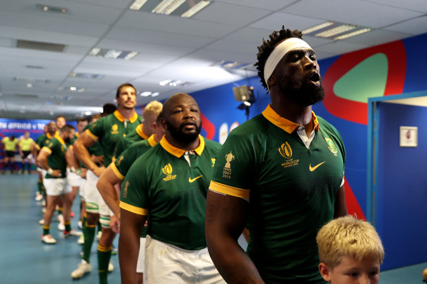 Siya Kolisi of South Africa leads their team out of the tunnel.