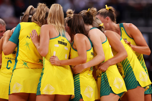 The Australian team form a huddle as they celebrate victory during game two of the International Test series between the Australia Diamonds and the England Roses 