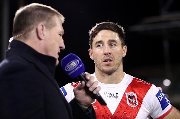 Matt Cooper (right) of the St. George Illawara Dragons speaks with NRL legend Paul Gallen.