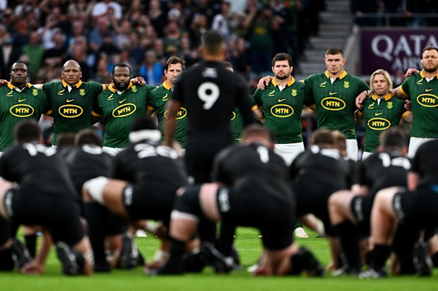 South Africa watch on as Aaron Smith of New Zealand leads the haka.