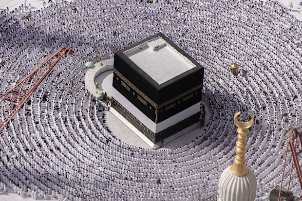 Muslim pilgrims converge on Saudi Arabia's holy city of Mecca for Hajj 