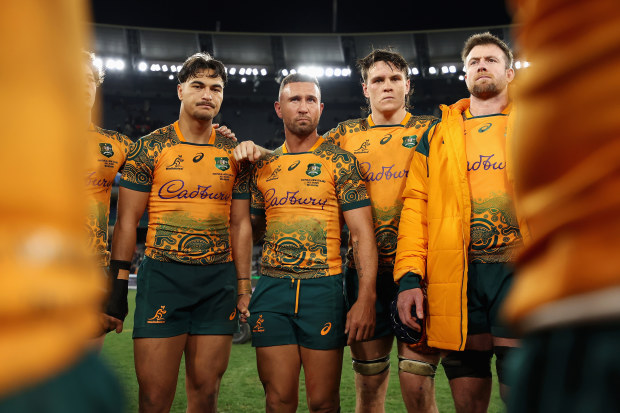 Quade Cooper of the Wallabies talks to teammates in a huddle after losing The Rugby Championship & Bledisloe Cup match against the All Blacks.