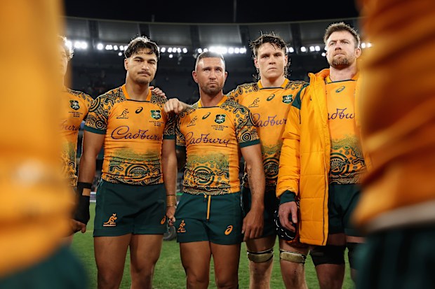 Quade Cooper of the Wallabies talks to teammates in a huddle after losing The Rugby Championship & Bledisloe Cup match against the All Blacks.