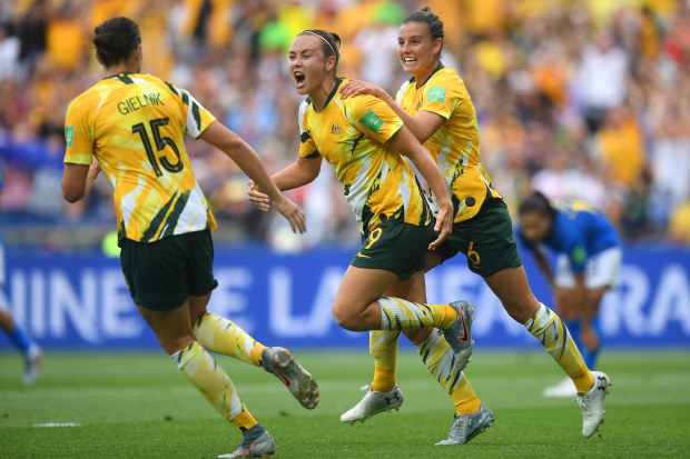 Caitlin Foord of Australia celebrates with teammates after scoring her team's first goal. (Photo by Michael Regan/Getty Images)