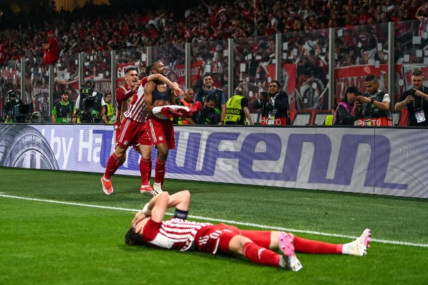 Ayoub El Kaabi of Olympiakos celebrates after scoring at the AEK Arena.