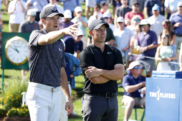 Jordan Spieth and Rory McIlroy bicker during The Players Championship.