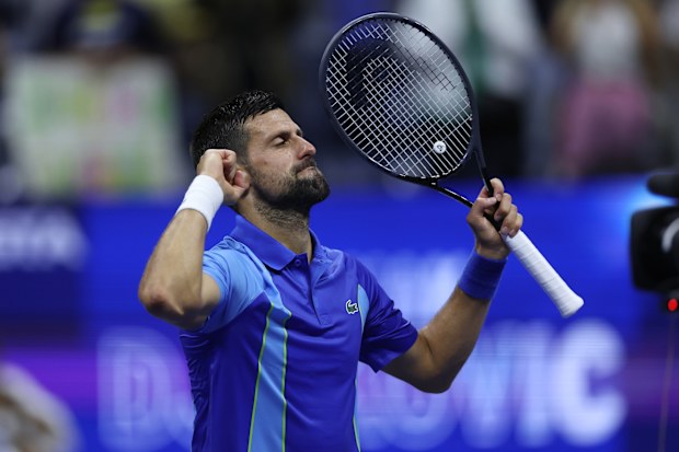 Novak Djokovic celebrates after defeating Alexandre Muller in the first round of the US Open.